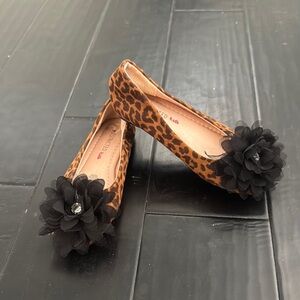 Restricted Leopard Print Flats with Black Accent